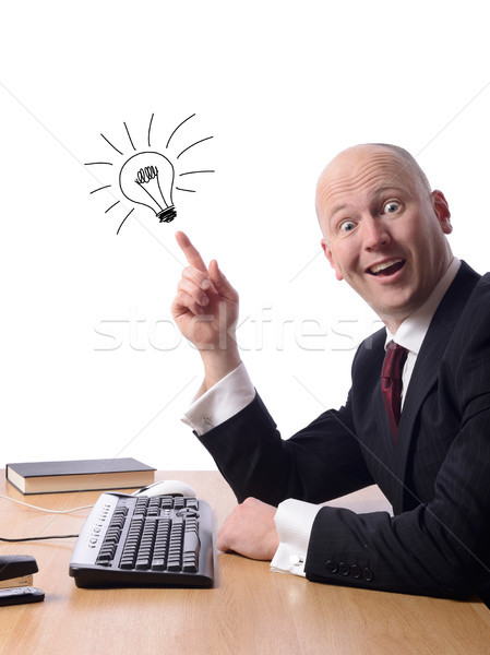 Goede idee zakenman vergadering bureau geïsoleerd Stockfoto © hyrons