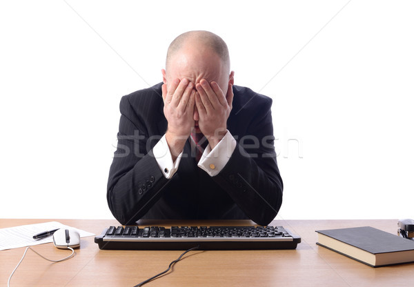 Stock photo: Businessman with head in hands