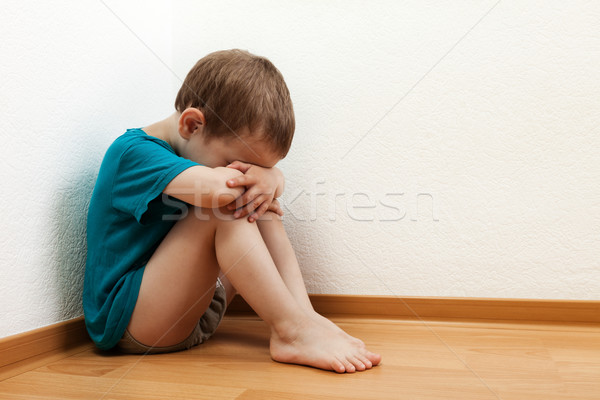 Gyermek büntetés kicsi fiú fal sarok Stock fotó © ia_64