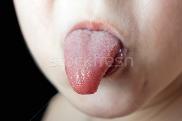 Sticking tongue Stock photo © ia_64