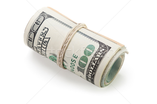 Stock photo: Rolled dollar currency