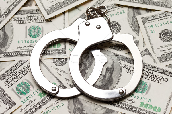 ストックフォト: 手錠 · ドル · 通貨 · 犯罪 · 法 · 紙