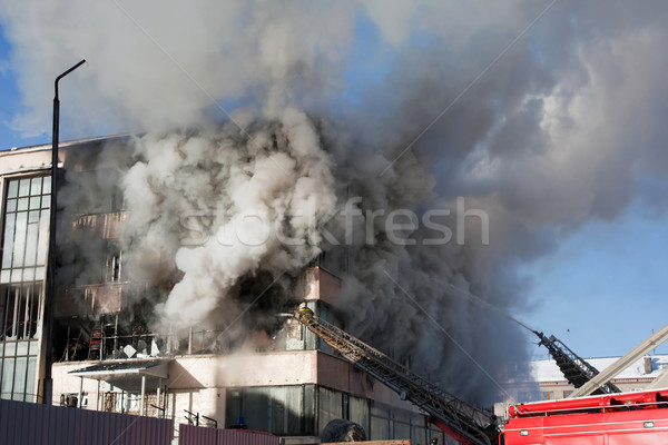 Feuerwehrmann Feuer Brennen Rauch Notfall Service Stock foto © ia_64