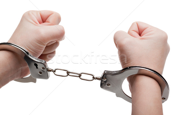 Kajdanki ręce policji prawa stali aresztować Zdjęcia stock © ia_64