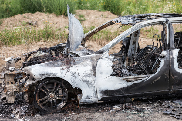 Arson fire burnt wheel car vehicle junk Stock photo © ia_64