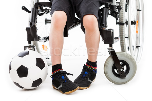 Niepełnosprawnych dziecko chłopca posiedzenia wózek Zdjęcia stock © ia_64