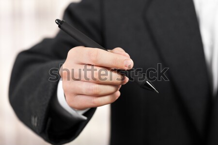 Hand holding ballpoint pen Stock photo © ia_64