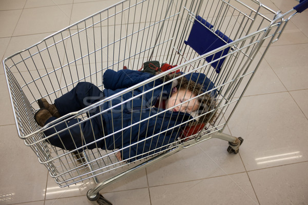 Child in shopping cart Stock photo © ia_64