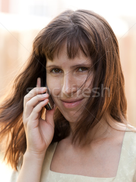 Women talking mobile phone Stock photo © ia_64