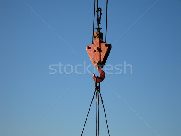 Hook of building crane lifting cargo Stock photo © ia_64