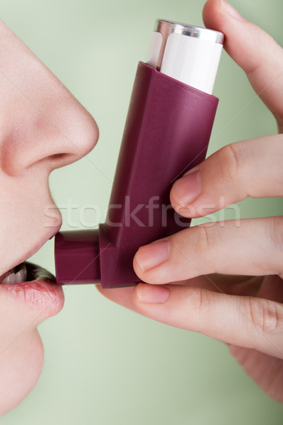 Women with asthmatic inhaler Stock photo © ia_64