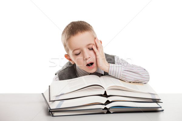 Gyermek ásít olvas könyvek fáradt fiú Stock fotó © ia_64