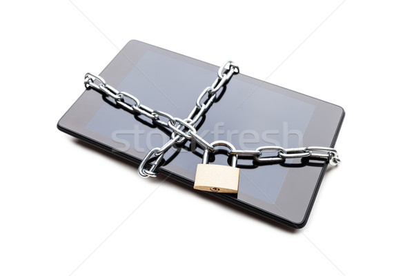 Chain link with padlock on smartphone or digital tablet computer Stock photo © ia_64