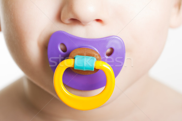 Gyermek baba cumi kicsi fiú műanyag Stock fotó © ia_64