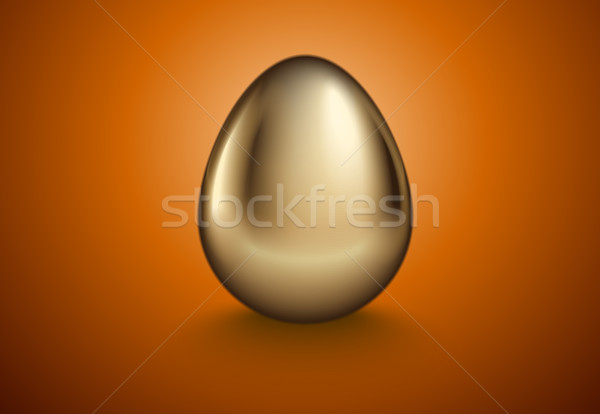 Glossy realistic golden egg. Isolated on orange background. Vintage banner, card, poster for Easter Stock photo © Iaroslava