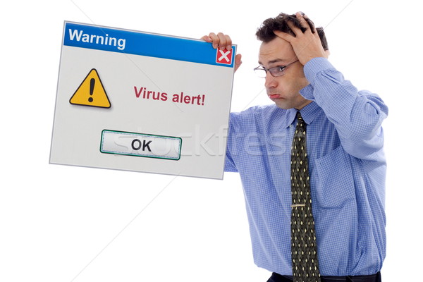 Vírus alertar confuso homem grande software de computador Foto stock © icefront
