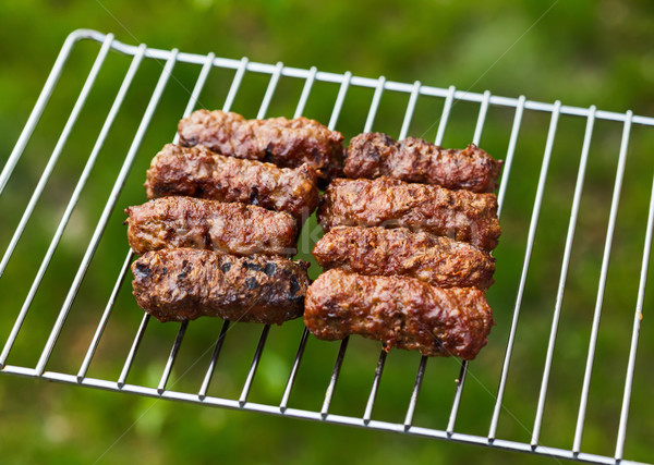 Grilled Romanian meat rolls - mititei, mici Stock photo © icefront
