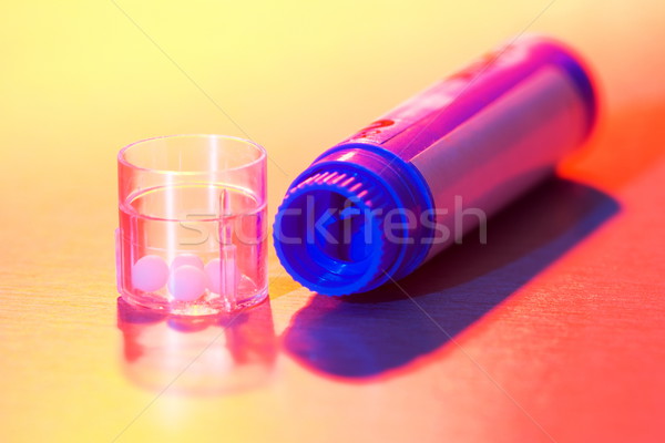 Homeopatycznych lek kolorowy świetle pojemnik mały Zdjęcia stock © icefront