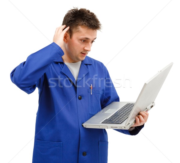 Jovem trabalhador algo homem laptop cabeça Foto stock © icefront