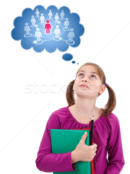 Teen schoolgirl thinking about social network Stock photo © icefront