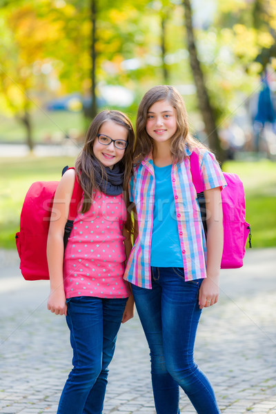 Stock photo: Teenage schoolgirls with schoolbag