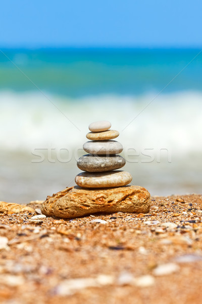 Stacked pebbles on the sea side Stock photo © icefront