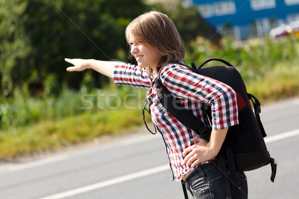 Teen girl hitch hiking Stock photo © icefront