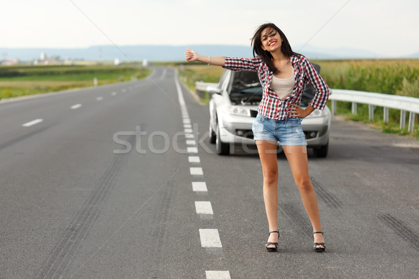 Donna driver gentilmente strada fronte auto rotta Foto d'archivio © icefront
