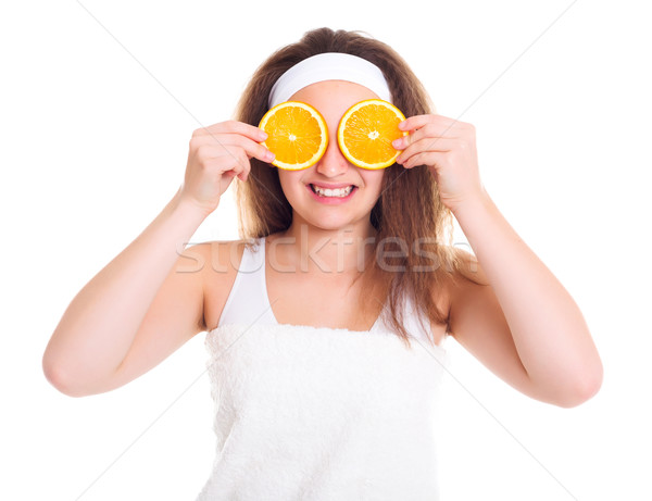 Girl with orange slices over her eyes Stock photo © icefront