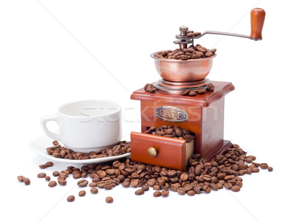 Old fashioned coffee ginder with cup and beans Stock photo © icefront