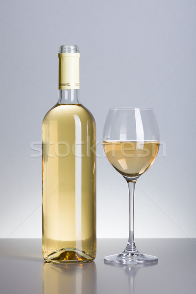 Bottle and glass of white wine Stock photo © icefront