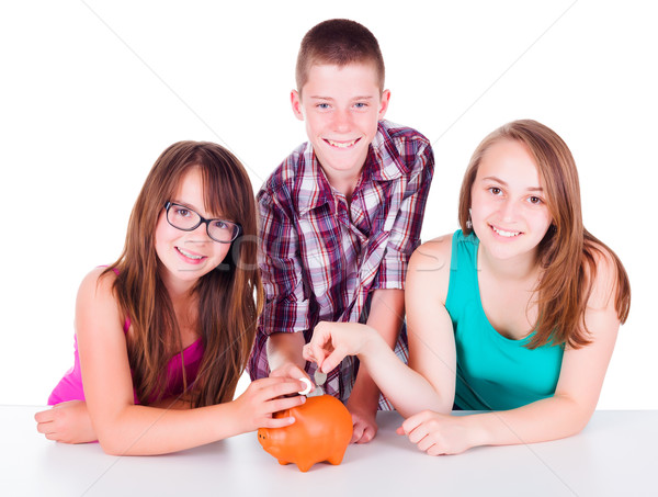 Tieners besparing geld toekomst drie munten Stockfoto © icefront