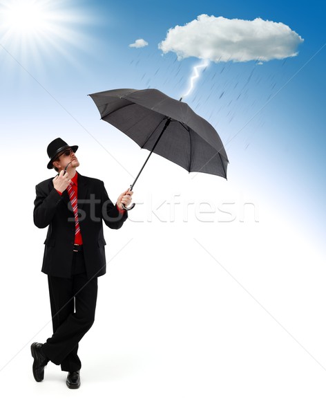 Man standing and protecting himself from disaster Stock photo © icefront