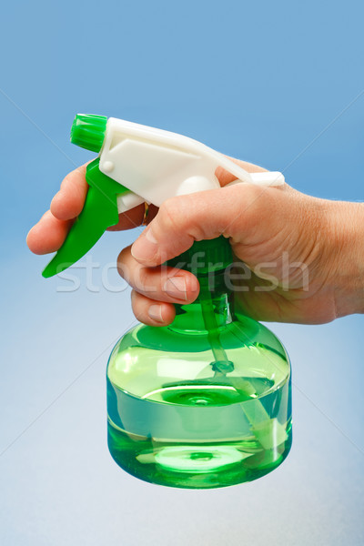 Hand holding water sprayer Stock photo © icefront