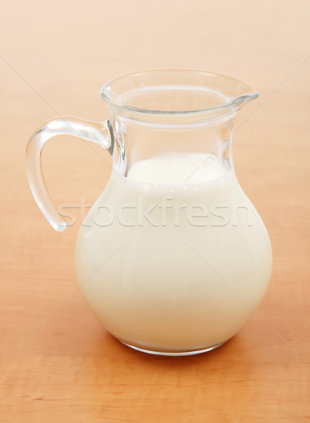 Glass jug full of milk Stock photo © icefront