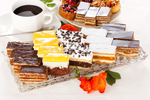 Various sweet cakes on oblong plate Stock photo © icefront