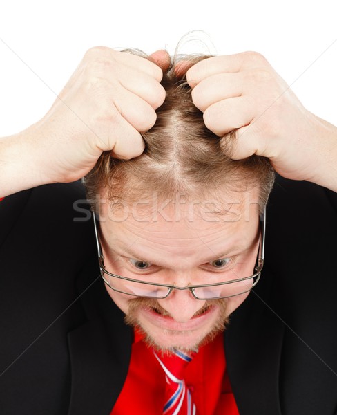 Distressed man pulling his hair Stock photo © icefront