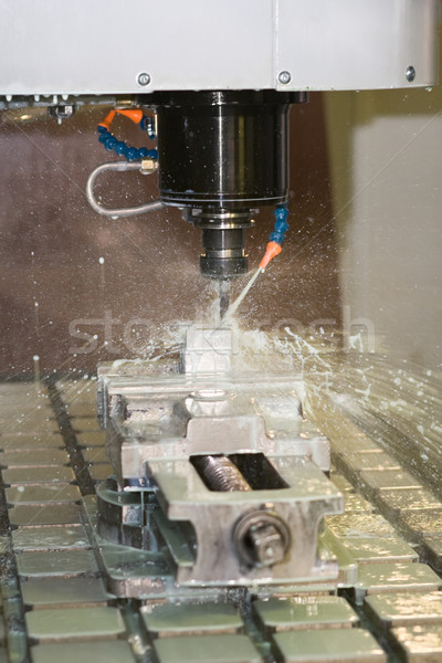 Milling machine working - cooling liquid Stock photo © icefront