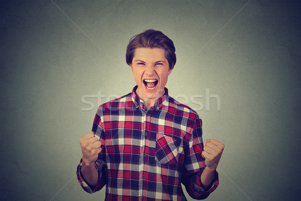 successful student, man with fists pumped Stock photo © ichiosea