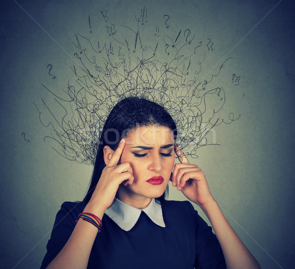 sad young woman with worried stressed face expression Stock photo © ichiosea