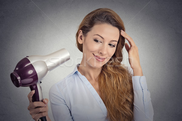 portrait beautiful woman with a hairdryer Stock photo © ichiosea