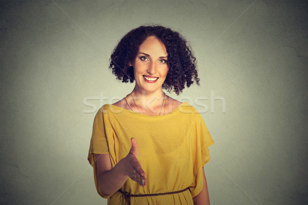 young smiling woman, student, customer service agent giving you handshake Stock photo © ichiosea