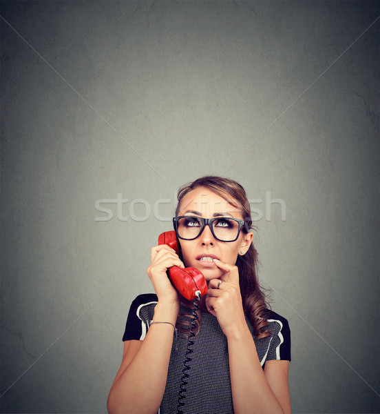 Preocupado perplejo teléfono teléfono mujer nina Foto stock © ichiosea