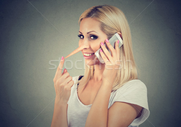 Boldog szőke nő hosszú orr beszél mobiltelefon Stock fotó © ichiosea