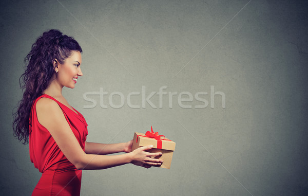woman giving a great present Stock photo © ichiosea