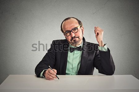 Stock photo: teacher holding book and pencil reading writing 