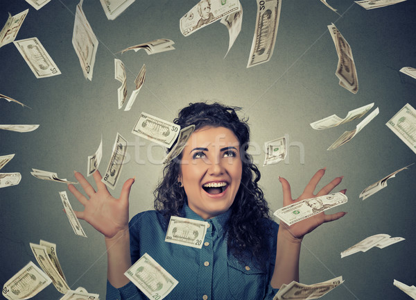 Mujer extático éxito dinero lluvia caer Foto stock © ichiosea
