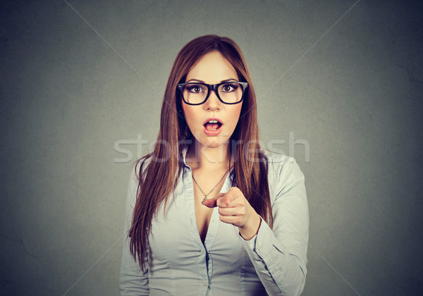 shocked business woman looking surprised pointing finger at camera  Stock photo © ichiosea