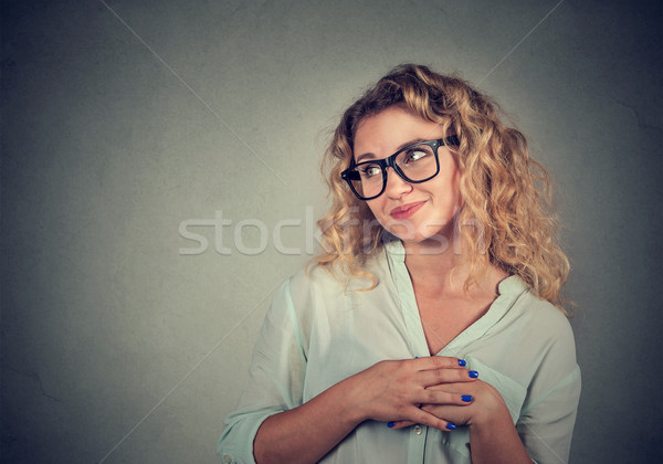 Lack of confidence. Shy young woman feels awkward  Stock photo © ichiosea
