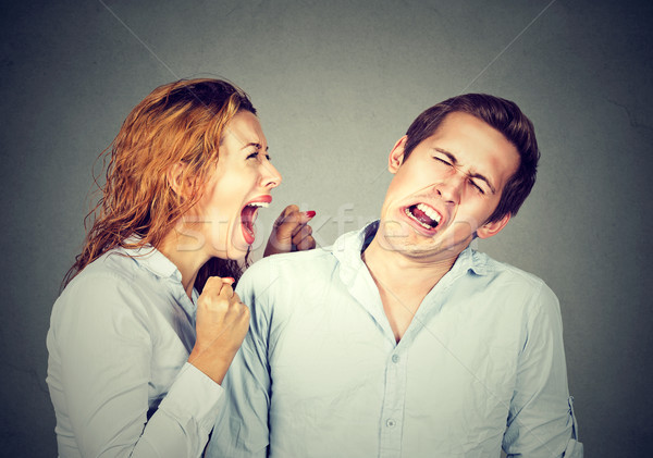 Angry woman screaming at her husband or boyfriend Stock photo © ichiosea